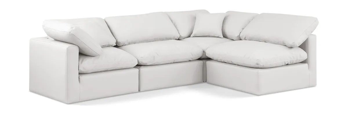 Indulge - Faux Leather 4 Piece Modular Sectional - Cream